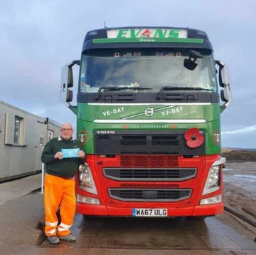 Richard standing next to his truck